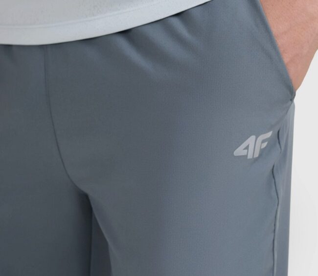 4F Akcia: Pánske rýchloschnúce bežecké nohavice TFTRM1253 grey